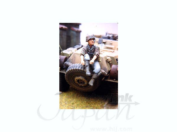 SS Soldier Pulling on Boot WWII