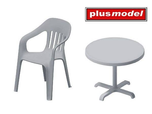 The set includes two plastic chairs and a round table. Made by 3D printing.