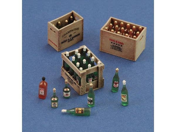 Champagne, cognac e wine bottles with crates