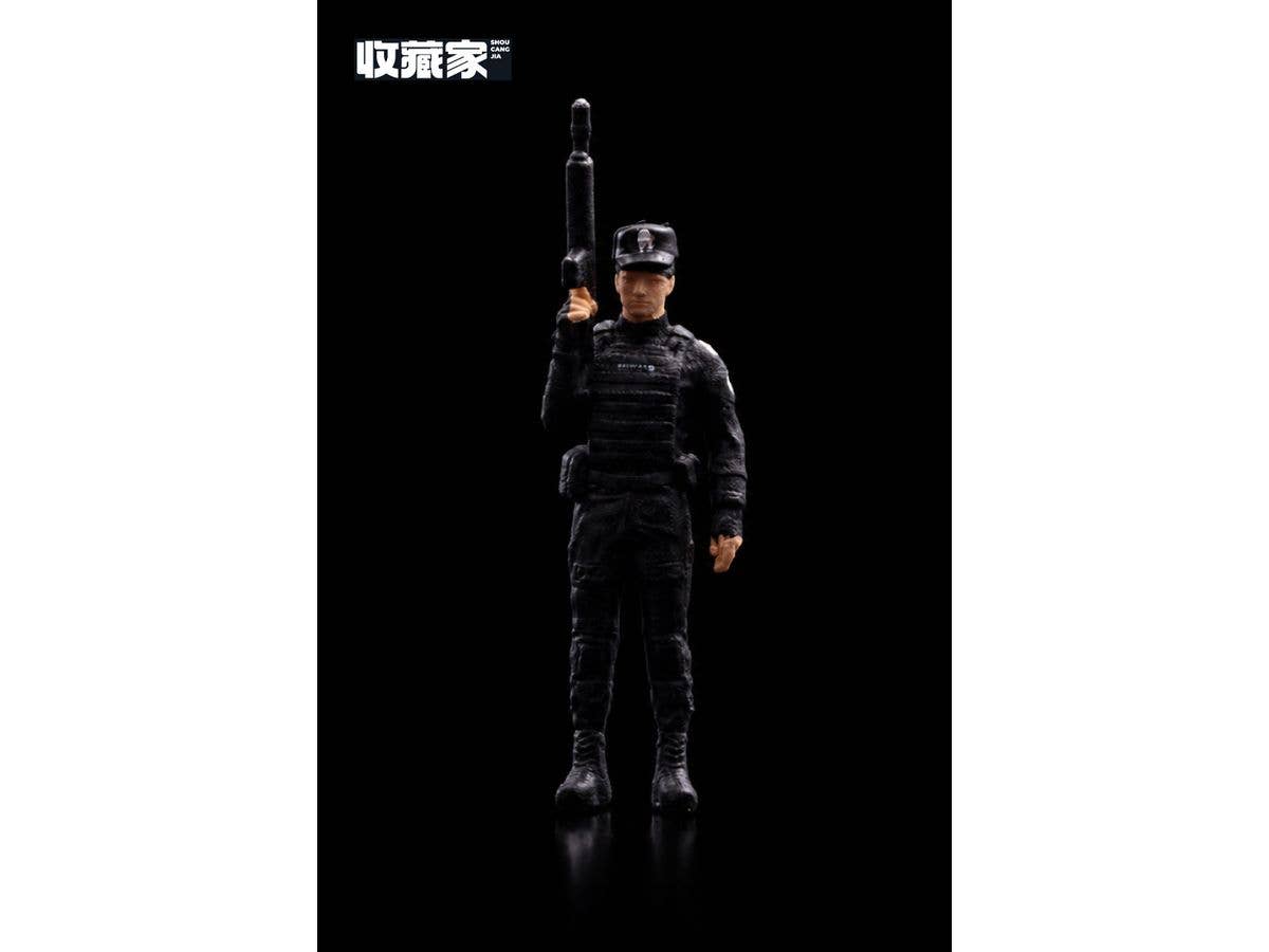 Figure: Special Forces - Male Police Officer Raising a Gun